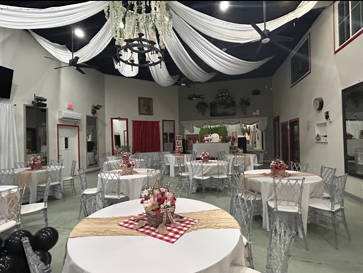 Elegant quinceañera decor with flowers and lights